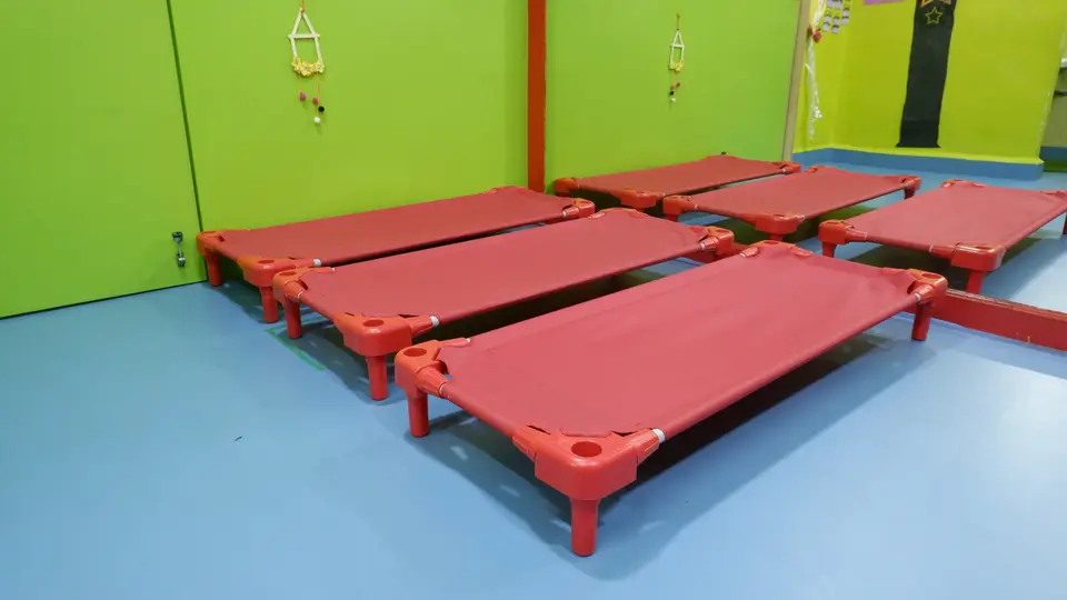 Day care nap room with individual cots