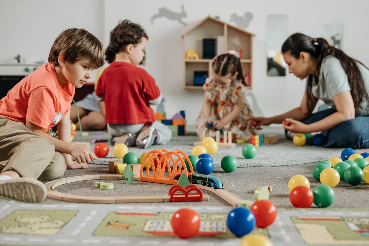 Kids playing with colorful toys in a kindergarten setting, fostering creativity and teamwork.
